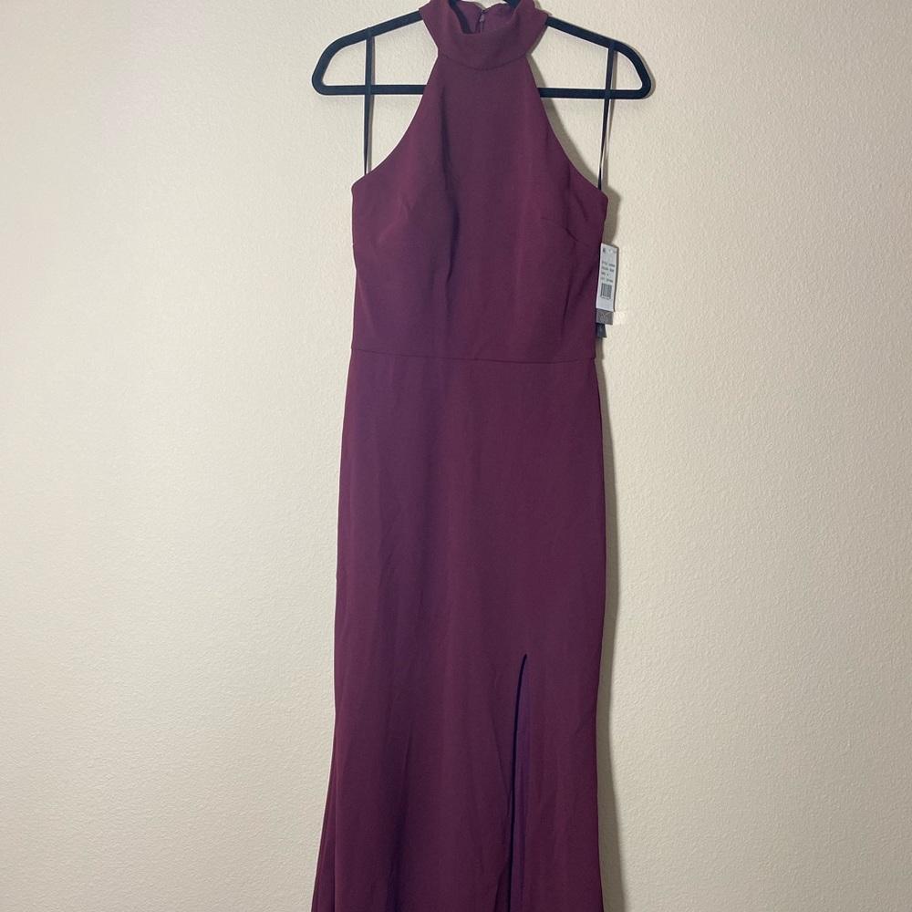 New with tag beautiful burgundy long evening dress .. Aqua dress size 4